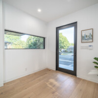 Open front door in modern home