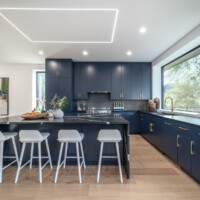 Dark open concept kitchen