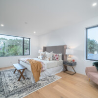 Large bedroom with two large windows